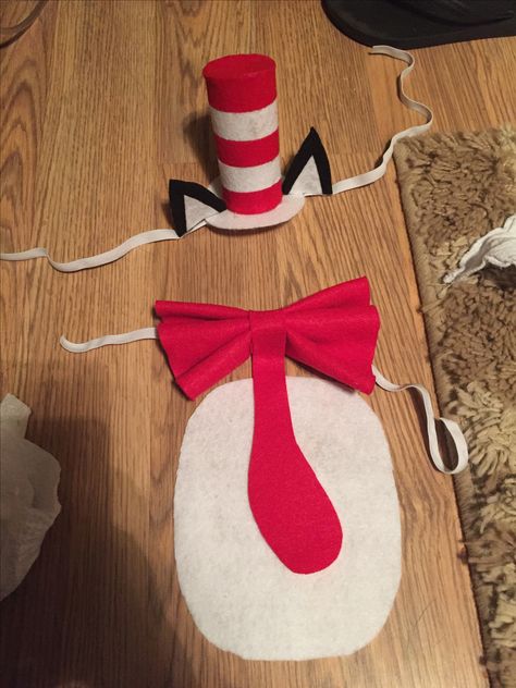 Baby cat in the hat costume DIY! Hat is made out of toilet paper roll and felt. Ears are a paper coffee cup covered in felt. Bow tie and belly patch also felt. I will attach the belly patch to a long sleeve black onesie. Diy Cat In The Hat Costume Kids, Diy Cat In The Hat Hat, Diy Cat In The Hat Costume, Cat In The Hat Diy, Nicu Costumes, Dr Seuss Diy Costumes, Childrens Book Character Costumes, Cat In The Hat Costume, Diy Girls Costumes