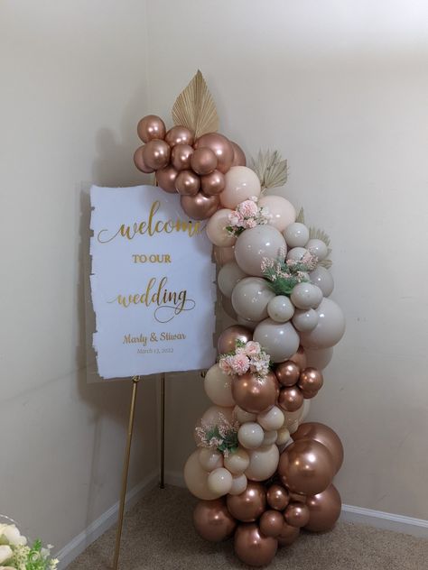 Beige Balloons Decor, Wedding Welcome Sign Balloons, Wedding Welcome Sign With Balloons, Balloons On Sign, Ballon And Flower Arch, Balloon Garland Welcome Sign, Balloons On Welcome Sign, Welcome Sign Balloon Decor, Welcome Sign With Balloon Garland