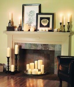 Decorating Fireplace & Mantle -would be cool with some colored candles or colored stones around the candles Fireplace With Candles, Unused Fireplace, Design Camino, Fake Fireplace, Candles In Fireplace, The Mantle, Faux Fireplace, Fireplace Makeover, Design Del Prodotto