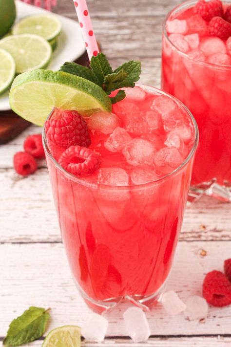 Raspberry Limeade | The Tickled Tastebud Raspberry Limeade, Raspberry Pretzel Salad, Raspberry Drink, Lime Lemonade, Raspberry Frosting, Iced Drinks Recipes, Pretty Alcoholic Drinks, Raspberry Recipes, Lemonade Drinks