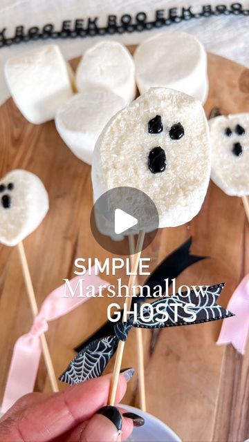 Andrea Clawson on Instagram: "Halloween treat idea: marshmallow ghosties 👻   These Halloween treats are so simple to recreate and will be perfect for any spooky night!   I took a jumbo @kraftjetpuffed marshmallows and cut them in half. I dipped them in white shimmer sugar and added a ghost face using black writing icing.  My boys loved adding them to their hot chocolate this morning. They would be perfect for Halloween s’mores or on top of cupcakes too!  Save for inspo and share with friends!   #halloweentreats #halloweenparty #halloweenpartyfood #halloweenkidsparty #craftymom #craftymomma #fallparty #partyideas #hostingaparty #halloweendesserts #halloweenfood #halloweensnacks #targethalloween #targetdollarspot" Marshmellow Treats, Halloween Kids Crafts Easy, Writing Icing, Marshmallow Ghosts, Marshmallow Halloween, Target Halloween, Halloween Treats For Kids, Spooky Night, Marshmallow Treats