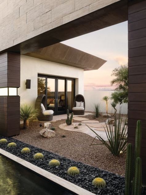 This guide will show you 37 desert landscaping ideas that are perfect for desert living. This modern and minimalist yard is perfect elegance. #desertlandscaping Desert Landscaping Fire Pit, Backyard Redesign, Desert Scape, Desert Backyard, Garden Ideas To Make, Arizona Backyard, Backyard Renovation, Drought Tolerant Garden, Rock Garden Design