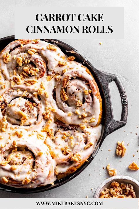 Carrot Cake Cinnamon Rolls with cream cheese icing and chopped walnuts on top nestled inside a cast iron skillet. Carrot Cake Cinnamon Rolls, Cake Cinnamon Rolls, Cinnamon Carrots, Brioche Dough, Cake Cinnamon, Sourdough Cinnamon Rolls, Cinnamon Roll Recipe, Carrot Spice Cake, Cinnamon Roll Cake