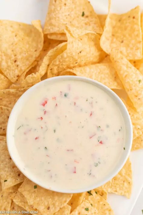 Best Mexican White Cheese Dip. Authentic queso dip that tastes like Mexican Restaurants white sauce recipe. Your entire family is going to love this authentic queso blanco recipe. This is one of my favorite cheese dip recipes. #eatingonadime #mexicanrecipes #diprecipes #cheesediprecipes #quesorecipes White Mexican Cheese Dip, Authentic Queso Dip, Authentic Queso, Mexican Cheese Dip Recipes, Mexican Cheese Dip, Queso Blanco Recipe, White Cheese Dip Recipe, White Queso Recipe, Mexican White Cheese Dip