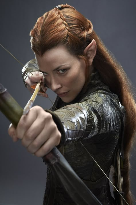 Tauriel was a Wood-elf of Mirkwood, and captain of the Elven guard of Thranduil's Woodland Realm. Tauriel is a non-canonical character; invented not by J.R.R. Tolkien, but for Peter Jackson's The Hobbit film trilogy. 1 Portrayal in adaptations 1.1 The Hobbit film trilogy 1.1.1 The Desolation of Smaug 1.1.2 The Battle of the Five Armies 1.1.3 Tauriel's fate 1.2 Voice dubbing actors 1.3 Video games 1.4 Behind the scenes 1.5 Controversy 2 Character 3 Etymology 4 Trivia 5 Gallery 6 References I do n Hobbit Cosplay, Legolas And Tauriel, Lord Of Rings, The Hobbit Movies, Desolation Of Smaug, Tauriel, Wood Elf, Evangeline Lilly, Bow And Arrow