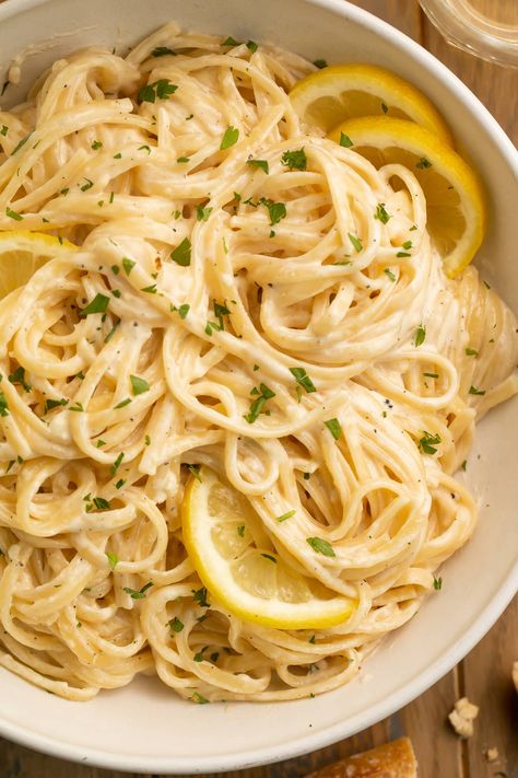 This lemon pepper pasta is creamy, with the perfect touch of bright lemon flavor and cracked black pepper. Quick, easy, and affordable, but still good enough for company. My new favorite pasta recipe! Herb Pasta Recipe, Lemon Pepper Pasta, Herb Pasta, Lemon Pepper Sauce, The Cozy Cook, Cozy Cook, Creamy Parmesan Sauce, Favorite Pasta Recipes, Creamy Lemon Chicken