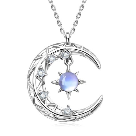 PRICES MAY VARY. Unique Design: This crescent moon pendant necklace featuring a round cut shimmering moonstone set on a sterling silver moon and star necklace frame combines with cubic zirconia. The moonstone looks transparent like a crystal, but when the stone is moving a blue glow appears. Very charming and romantic. Precious Material: Moonstone is the symbol of light and hope, which also can embrace the wonders of the universe. it can nourish, give passion, and awaken your feminine energies. Stone Pendant Design, Moon Crystal Necklace, Star Necklaces, Moon Accessories, Moon Necklaces, Moon Symbols, Moon Necklace Silver, Planet Necklace, Necklace Moon