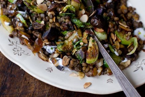 A good cold-weather stir-fry recipe. Tiny potatoes, brussels sprout wedges, toasted almonds and lentils are served with a drizzle of mint and a bit of thinned-out, salted plain yogurt, and a sprinkling of chopped dates. Vegan Potluck, Thanksgiving Salad, French Lentils, Satisfying Salads, Healthy Weeknight Dinners, Lentil Salad, Keto Paleo, Lentil Recipes, Vegan Salad