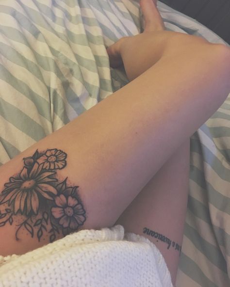 wildflower thigh tattoo Thigh Tattoo Simple, Small Flower Tattoo, Small Thigh Tattoos, Sunflower Tattoo Thigh, Upper Leg Tattoos, Upper Thigh Tattoos, Sunflower Tattoo Sleeve, Sunflower Tattoo Shoulder, Tattoo Placements