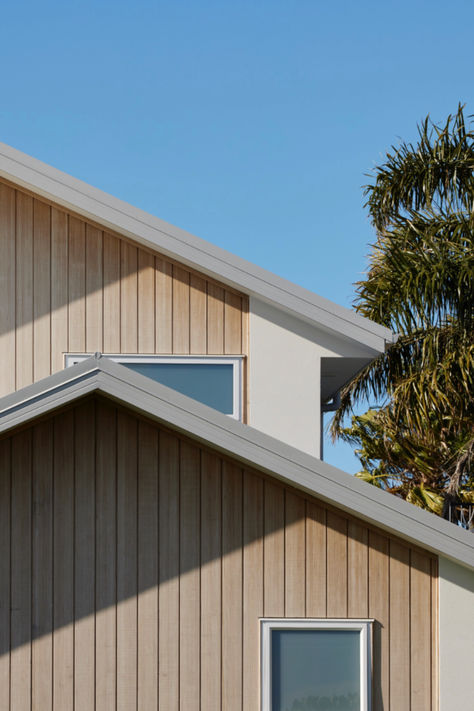 Coastal cool with a modern twist. Vertical cladding adds a unique texture to this beach home, creating a warm and inviting atmosphere. #verticalcladding #exteriorfacade #exteriordesign #cladding #coastalhome #coastaldesign #coastalhomedesign Vertical Wood Cladding, Vertical Cladding, Modern Coastal Home, Designer House, Wood Cladding, Coastal Home, New Home Builders, Coastal Design, Modern Coastal