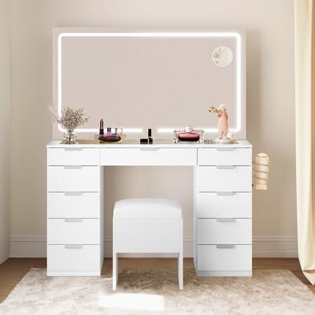 Product Description Elevate your beauty corner with this elegant white Vanity Desk Set. The combination of a LED lighted mirror, glass top, and ample storage ensures both style and functionality. It's an ideal gift for your loved ones on birthdays, holidays, or special occasions. Whether you're getting ready for a night out or a professional live broadcast, this vanity desk set is a perfect choice for creating a personalized and organized beauty space. Specifications Color :White Material:Engineered Wood Product Dimensions :11.7"D x 46.06"W x 55.9"H Fabric Type :Mdf Size: One Size. Glass Vanity Ideas, Cute Bedroom Vanity, Vanity Ideas Bedroom Glass Top, Desk With Vanity Mirror, Corner Vanity Ideas Bedroom, Vanity Desk With Mirror And Lights, White Vanity Bedroom, Vanities For Bedrooms, Vanity Desk Organization