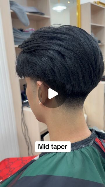 Leeo Critchlow | Bangkok Barber on Instagram: "Middle part mid taper fade 🔥 hairstyle to try in 2024!  To book your appointment, click the link in my bio!📲  • •  #texturedfringe #taperfade #taper #menshaircut #barberbangkok #bangkokbarber #taperfadesbangkok #fijiicuts #babylissthailand #dropfade #barber #lowfade #explorepage #middlepart #taperfadehaircut" Mid Taper Middle Part, Burst Fade Middle Part, Tapered Middle Part, Taper Fade Middle Part, Middle Part Taper Fade, Mid Taper Fade, Mid Taper, Middle Part Haircut, Fade Hairstyle