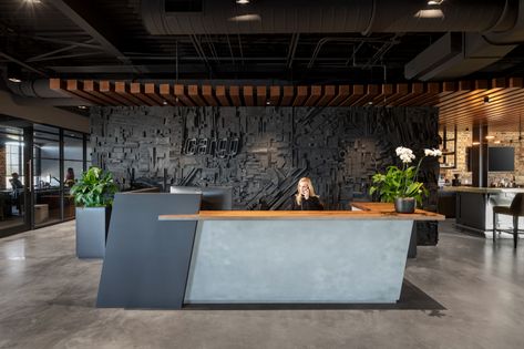 Cargo Offices - Greenville | Office Snapshots Industrial Reception, Industrial Office Space, Restoration Hardware Lighting, Open Ceiling, Shuffleboard Table, Wood Beam Ceiling, Sales Office, Cement Floor, Office Snapshots