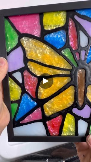 Easy Stained Glass Tutorial | Here's a step by step tutorial on how to turn Dollar Tree picture frames into faux stained glass 😍 

This is a great project for spring/Easter that kids... | By Emily Seilhamer Art | Let me show you how to turn
Dollar Tree picture frames into stained glass art. All you need
is a picture frame. I'm going to use two different sizes
today and some simple patterns. I sketched out a cross and a
butterfly but you could print off simple coloring book pages
or there's even free stained glass art images that you can
download and print as well. So, decide what pattern you're
going to use and then you're going to put it in the frame
pattern side down against the glass just like you were
framing it yourself. I like to tape my image on one side just
to make sure it doesn' Faux Stained Glass Diy How To Make, Easy Glass Painting, Stain Glass Butterflies, Stained Glass Art Easy, Painting On Glass Frame, Homemade Stained Glass Paint, Stained Glass With Glue And Paint, How To Make Stained Glass Art, Faux Stained Glass Diy