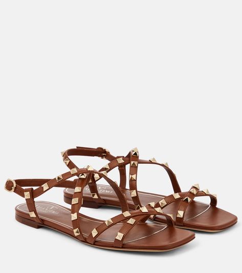 Rockstud leather sandals in brown - Valentino Garavani | Mytheresa Valentino Rockstud Flats, Rockstud Flats, Valentino Sneakers, Valentino Sandals, Latest Sandal, Valentino Garavani Shoes, Embellished Flats, Leather Sandals Flat, Brown Leather Sandals