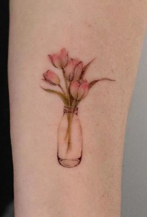 The Illustrated Guide to Tulip Tattoo Meanings Tulip Tattoo Meaning, Tulip Bouquet Tattoo, Tulips Tattoo, Bella Tattoo, Tulip Tattoos, Apple Tattoo, Lily Flower Tattoos, Tulip Tattoo, Wrap Tattoo