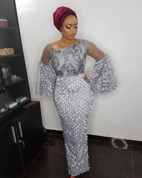 Pretty woman in a pretty dress. Outfit by @fablanebyderin #grey #turban #wine #makeup #beautiful Nigeria Lace Dress Style, Sugar Lace Dress Styles, Wine Makeup, Sugar Lace, African Lace Styles, Afrikaanse Mode, Lace Dress Styles, Naija Fashion, Aso Ebi Styles