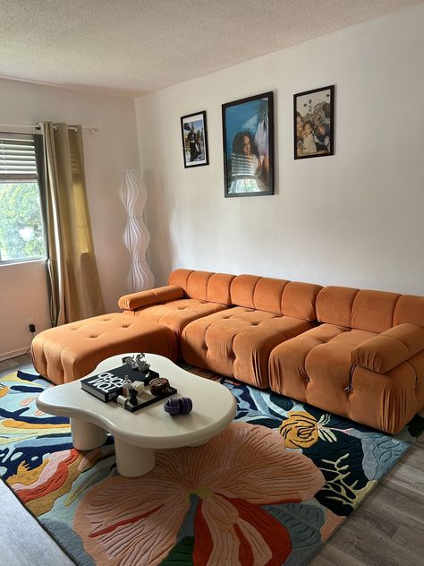 Orange Couch Living Room, Mcm Apartment, Apartment Decor Modern, 2024 Home Decor Trends, Inviting Home Decor, Maximalist Apartment, Design Hairstyle, House In The Mountains, Orange Living Room