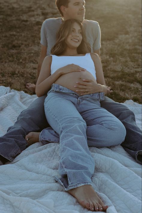 Maternity Jeans Photoshoot Couple, Maternity Photos Belly Showing, Open Jeans Maternity Photos, Maternity Pictures Outfits Summer, Blue Jeans And White Shirt Maternity Shoot, Maternity Photography With Daughter And Husband, Maternity Photo With Jeans, Open Jean Maternity Photos, Casual Jeans Maternity Shoot