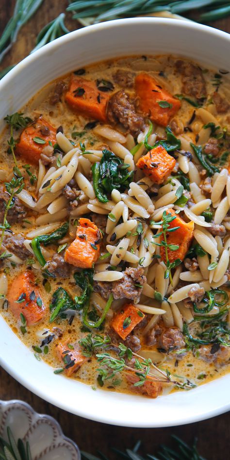 Creamy Butternut Squash and Sausage Soup with Orzo and Spinach in a white bowl. Squash And Sausage Soup, Butternut Squash Sausage Soup, Orzo And Spinach, Spinach And Orzo, Butternut Squash And Sausage, Soup With Orzo, Butternut Squash Sausage, Soup With Spinach, Creamy Butternut Squash