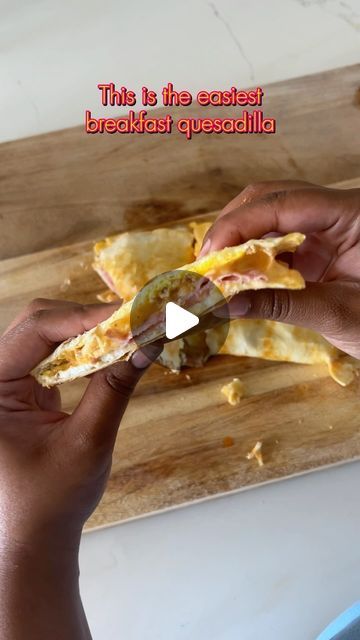 Brittnee on Instagram: "This hack makes the easiest breakfast quesadilla you’ll ever make!  I used low carb tortillas filled with eggs, cheddar, bacon, ham and American cheese but you can use any of your favorite fillings.  Add your tortilla to a lightly oiled skillet, crack your eggs, cover and cook for 3-4 minutes.  Stuff it with whatever you want, cover and cook for another 2-3 minutes and you’re done!   #breakfastquesadilla #breakfasthack #easybreakfast #easyrecipes #lowcarbbreakfast" Keto Breakfast Tortillas, Easiest Breakfast, Breakfast Tortilla, Breakfast Hack, Egg Skillet, Breakfast Quesadilla, Ham And Eggs, Bacon Egg And Cheese, Cheese Quesadilla