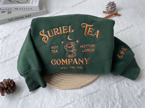 Suriel Tea Company Embroidered Sweatshirt, Acotar Bookish Embroidered, SJM Embroidered Sweatshirt, A Court Of Thorns And Roses Hoodie velaris,Embroidered Valeris,Velars sweatshirt,sjm bookish,acotar sweater,bookish shirt,bookish sweat,suriel tea co,sarah j maas sweat,acotar velaris tee,Embroidered shirt,gift for book lover,suriel tea sweater ❗️Place your ORDER NOW with Exclusive Discount this Week! -------------------------------------------- ❗️PRODUCT DETAILS How to Customize: - Choose your pre Suriel Tea, Acotar Velaris, Tea Company, Court Of Thorns And Roses, Tea Companies, Sarah J Maas, Sarah J, Embroidered Sweatshirt, Embroidered Sweatshirts