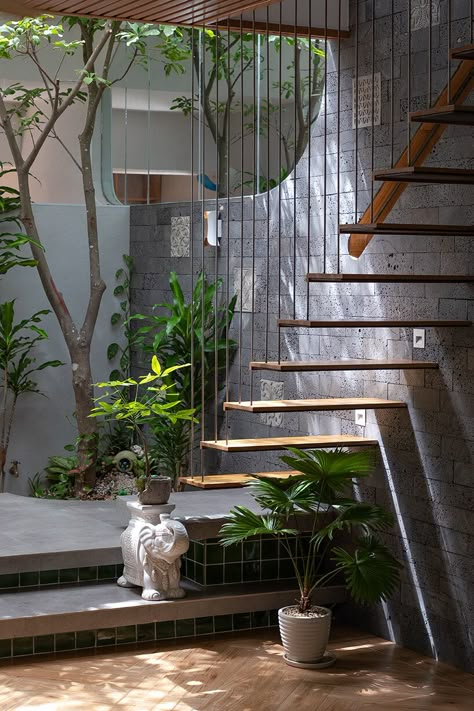 glass-brick 'coco house' in vietnam evokes otherworldly nostalgia Circle Stairs, Plan Render, Stair Design Architecture, Ultra Minimalist, Grey Farmhouse, Garden Interior Design, Upper West Side Apartment, Tropical Modernism, Inner Garden