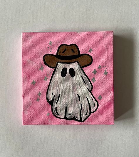 "3\"x3\" Pink Hand Painted Sparkle Halloween Ghost with Cowboy Hat Canvas Painting This small ghost painting is the perfect addition to your fall/Halloween decor.  Hand painted on a 3\"x3\" canvas with acrylic paint, each painting is one of a kind.  A great gift for a friend or family member or perfect just for you!" Quick Easy Paintings, Spooky Season Canvas Painting, Pink Spooky Painting, Preppy Halloween Painting, Halloween Small Canvas Painting, Spooky Season Painting Ideas, Paint And Sip Halloween, Simple Spooky Painting Ideas, 4x6 Painting Ideas