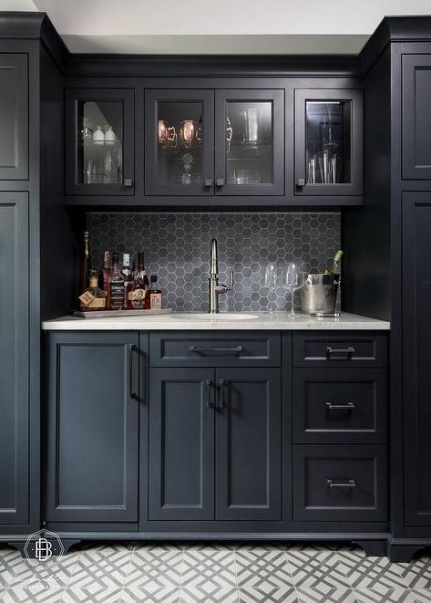 Chic black wet bar boasts black shaker cabinets donning matte black pulls and a white granite countertop. Black Shaker Cabinets, Wet Bar Cabinets, Wet Bar Designs, Home Wet Bar, Home Bar Rooms, Basement Bar Designs, Home Office Inspiration, Home Coffee Bar, Home Bar Designs