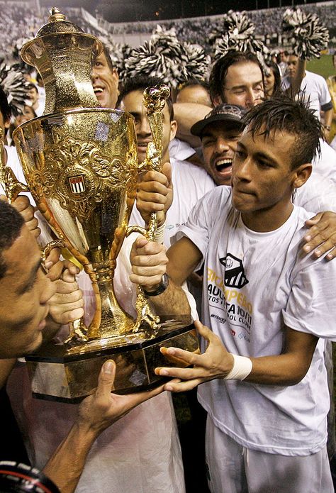 SANTOS, BRAZIL - MAY 15:  Neymar (R) of Santos celebrates after winning the 2011 Sao Paulo State Championship at Vila Belmiro stadium on May 15, 2011 in Santos, Brazil. (Photo by Eduardo Anizelli/LatinContent/Getty Images) Neymar In Santos, Santos Neymar Jr, Neymar At Santos, Santos Brazil, Neymar Jr Wallpapers, Honda Cb750, Soccer Guys, Leo Messi, Sports Games