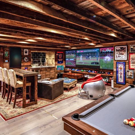 High Ceiling Basement, Classy Sports Basement, Antique Basement Ideas, Barndominium Basement, Sports Bar Basement Ideas, Cool Basements, Basement Hallway Ideas, Large Basement Ideas Layout, Home Sports Bar Ideas