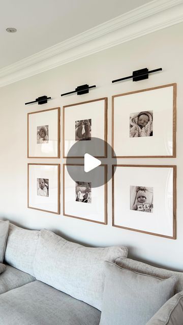 Nikki Jackson  🤍 on Instagram: "I still get so many DMs/comments about our little gallery wall so I thought I would repost and tag where all is from again 🤗  • Battery wall lights - @online_lighting * Although they look black, mine are the bronze large size  • Frames - 50x50 @hmhome   • Inserts - @ebay_uk   All links, details and sizes on my “new links” highlight ❤️  *previously gifted  #gallerywall #batterywalllights #walllights #picturelights" Photo Wall Lighting Ideas, Gallery Wall With Picture Lights, Gallery Wall With Lights, Gallery Wall Lighting, Wall Behind Sofa, Battery Wall Lights, Townhouse Decor, Couch Wall Decor, Hallway Wall Lights