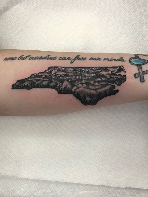 North Carolina with Mountains,Hills,Trees,Space,Moon,Nighttime black ink tattoo by Joe Juggie Carolina Tattoo, North Carolina Tattoo, Knight Tattoo, Western Nc, Head Tattoos, American Traditional Tattoo, Black Ink Tattoos, Body Piercings, Nature Tattoos