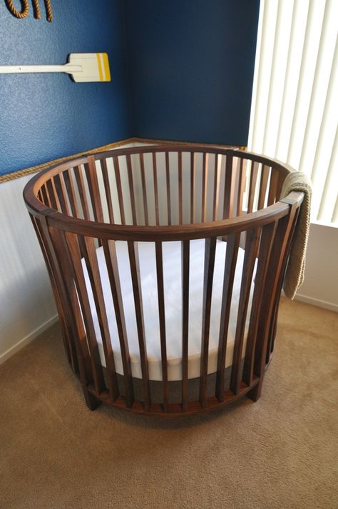 My first piece of furniture. Not the easiest first project, but it turned out well. The species is black Walnut with Mortise and tenon joinery. The crib is built in two halves. 3/16" Brass pins... Round Crib Nursery, Round Baby Cribs, Round Crib, Cribs Baby, Baby Co Sleeper, Round Cribs, Best Baby Cribs, Diy Space Saving, Crib Design