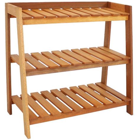 Keep your gardening tools organized, store extra planters and pots, or display your favourite herbs, flowers, greens, and budding veggies with this sturdy garden shelf plants stand. This convenient outdoor shelf is made from durable yet lightweight Meranti wood with a stylish teak oil finish and has a contemporary design that is sure to complement any outdoor decor style while remaining durable against the elements. It has three sturdy, wooden storage shelves to store a number of home items such Cinderblock And Wire Shelf Plant Table, Potting Shelves Outdoor, Outdoor Shelf Plants, Homemade Tiered Plant Stands, Homemade Shelf Stand, Rattan Planter Shelf, Wooden Plant Shelf Indoor, Plant Stands Kitchen, Wooden Window Plant Shelf