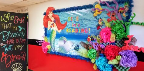 Little Mermaid Bulletin Board #bulletinboard #reading #diveintoreading #littlemermaiddecorations #disneytheme Mermaid Classroom Door, Mermaid Bulletin Board Ideas, Little Mermaid Classroom Theme, Little Mermaid Bulletin Board, Mermaid Bulletin Board, Mermaid Classroom, Fairytale Classroom, Little Mermaid Quotes, Little Mermaid Decorations