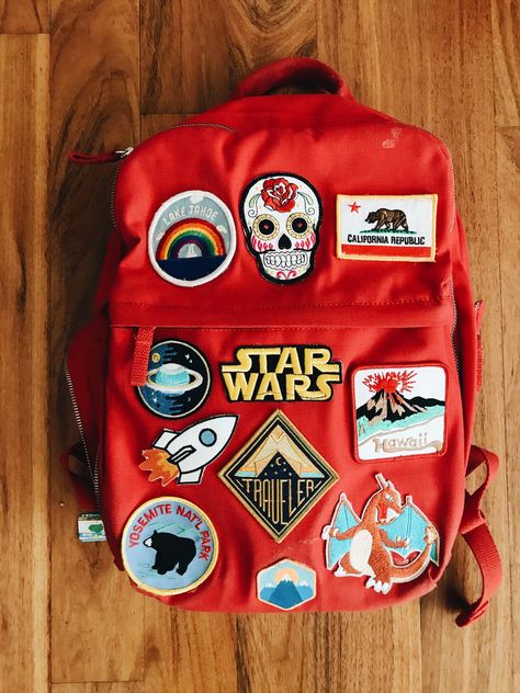 A few years ago, Aron’s parents sent home a childhood backpack, adorned with patches from faraway places. It’s been hanging in Hudson’s closet ever since, reminding me that I wanted to help Hudson pick out patches for one of his own. We didn’t quite get to it in time for Kindergarten, but this year—after I … Backpack Decoration Ideas, Sew Backpack, Decorate Your Backpack, Backpack With Pins, Diy Backpack Pattern, Mochila Jansport, Bag Patches, Backpack Patches, Patch Ideas