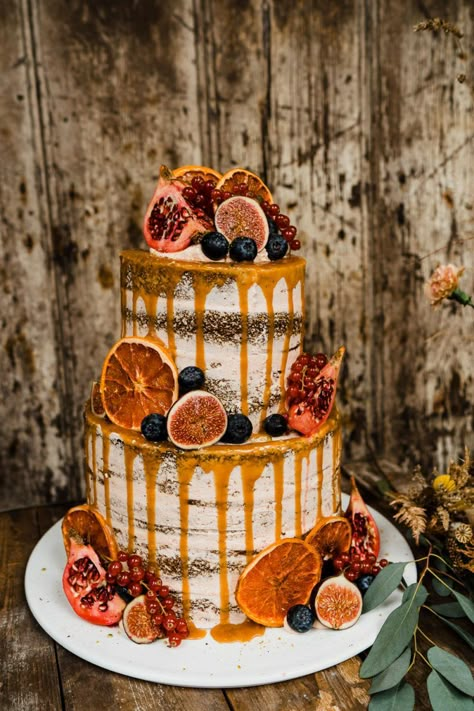 Semi Naked Wedding Cake with Orange Drip and Fig Decor | Autumn Wedding Ideas at Patrick's Barn Styled by Events by Design with Black Wedding Dress, Drip Cake & Pastry Table by Annamarie Stepney Photography Wedding Cake Designs For Fall, Black And Orange Wedding Cake, Autumnal Wedding Dress, Autumn Cakes Ideas Fall, Birthday Cake Autumn, Fall Naked Cake, Naked Cake Decorating Ideas, Autumn Cake Ideas Birthday, Orange Drip Cake