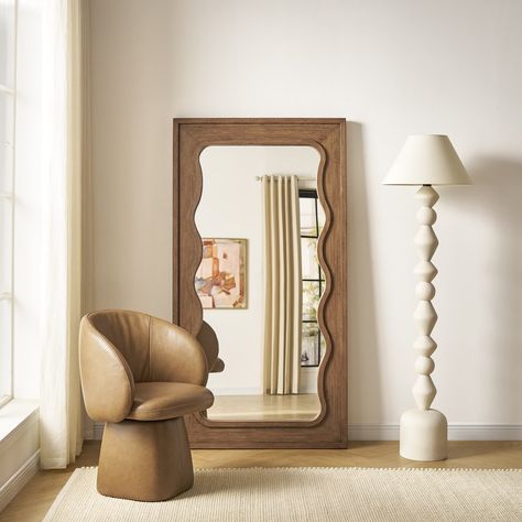 Sculpted with an architectural silhouette and chunky base, Cassidy is a 360° swivel chair that sits well in both the dining room and reading nook. Minimalistic Room, Large Floor Mirror, Nyc Apt, Floor Length Mirror, Room Aesthetics, Leather Swivel Chair, Wavy Design, Interior Room, Coffee Table Rectangle