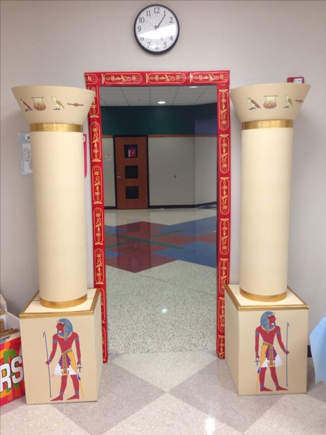 Made two "Egyptian Tomb Columns". Cardboard boxes and concrete tubes. Plastic dollar ice tubs for the tops. HVLP'd tan. Printed stickers and applied for details Egypt Vbs Decorations, Egyptian Columns, Egypt Decorations, Egyptian Themed Party, Egypt Vbs, Egyptian Decorations, Egyptian Halloween, Egyptian Crafts, Egyptian Tomb