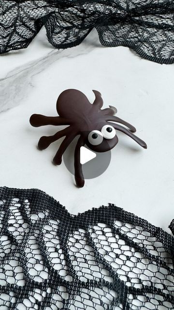 Stephanie Niemis on Instagram: "POV: You discovered the cutest way to decorate a cupcake for Halloween 🕷

⭐️ Follow for more fun Halloween treats! ⭐️

To make this chocolate spider…
🕷Pipe dark chocolate on a piece of parchment paper to look like a spider. You could place a printed out spider underneath the parchment paper to trace, but I just drew 4 pairs of legs then a circular head and torso.
🕷Lay the parchment paper over a rolling pin and place in the refrigerator until it sets (about 15 minutes). Once set, carefully remove the parchment paper from the spider.
🕷Add a little dark chocolate to the bottom of a pair of candy eyes and place them on the spider. Enjoy!" Chocolate Spiders, Halloween Treats To Make, Candy Eyes, Fun Halloween Treats, Zucchini Bread Recipes, Halloween Cupcakes, The Spider, Candy Making, Parchment Paper