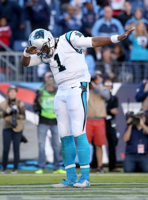 Carolina Panthers quarterback Cam Newton dabs for the crowd after scoring a touchdown during the second half against the Tennessee Titans at LP Field on Sunday. Parties Food, Panther Nation, Carolina Panthers Football, Panthers Football, Unapologetically Black, Cam Newton, Beautiful Human, Patriotic Party, Sport Player