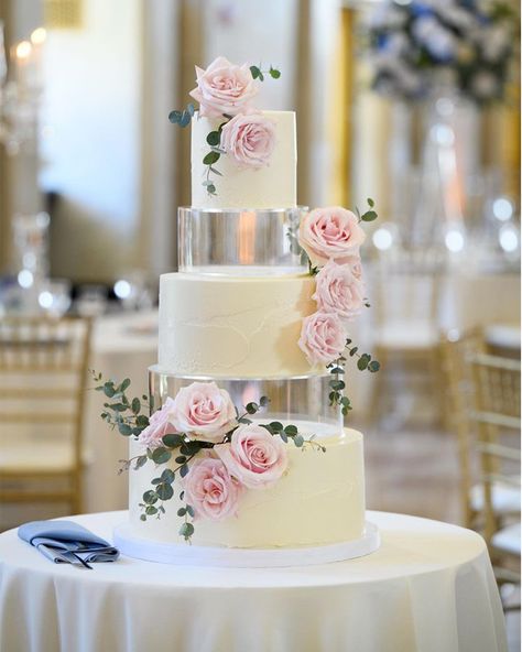 Multiple tiered buttercream wedding cake with clear tiers and fresh flowers at The Old Post Office in Chicago made by ECBG Cake Studio, Chicago’s favorite custom and specialty cake studio. Spackled buttercream texture.   ECBG Cake Studio makes luxury wedding cakes for the Chicago area. Business owner, Erin Martin ECBG (Erin's Custom Baked Goods) Cake Studio Wedding Cake With Separated Tiers, Wedding Cakes With Clear Tiers, Cake With Clear Tier, Wedding Cake With Clear Tiers, Wedding Cake With Separator, Two Layer Wedding Cakes, Burgundy And Cream Wedding, Multiple Wedding Cakes, Buttercream Texture