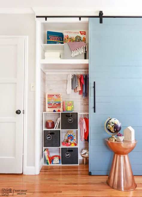 Awesome storage for toys books and clothes. And, be still my heart...i do love me a sliding barn door of any kind. Closet Door Alternatives, Small Bathroom Door Ideas, Small Bathroom Door, Diy Closet Door, Closet Door Alternative, Door Alternatives, Diy Closet Doors, Nursery Makeover, Wooden Sliding Doors