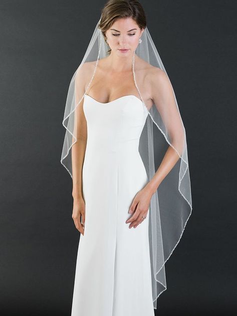 Grace your silhouette with magical sparkle. This enchanting design is a 1-tier waltz length veil with a cascading edge of narrow silver beadwork and crystals. Adding subtle shimmer, this romantic length combines effortless beauty with pure glamour. Waltz Length Veil, Custom Bridesmaid Dress, Sleek Dress, Long Veil, Wedding Hair Clips, Wedding Veils, Bridal Veil, Waltz, Bridal Hair Accessories