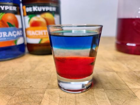 Red White and Blue Shot Red White Blue Shots Alcohol, Red White And Blue Shots, Red White And Blue Cocktails, Blue Curacao Shots, Rum Shots, Layered Shots, Cinnamon Schnapps, Patriotic Drinks, Blue Punch