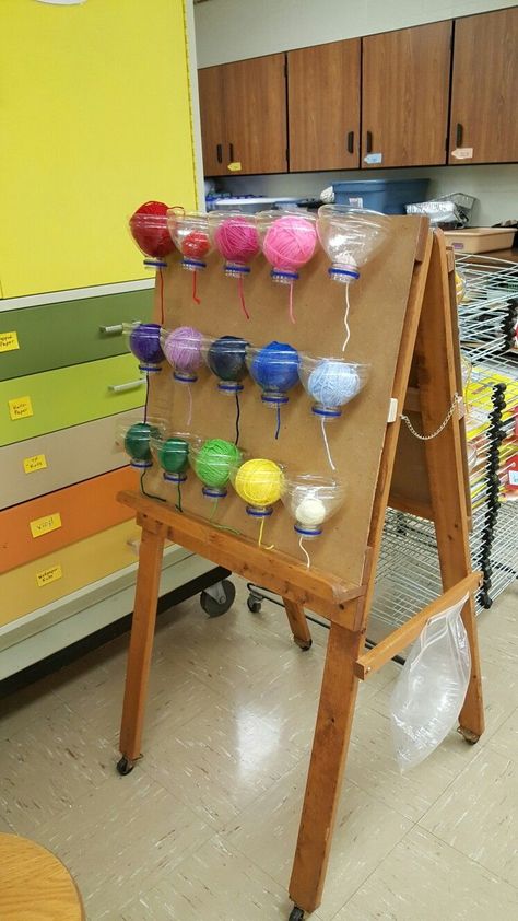 Nursery Art Area Ideas, Preschool Room Decor Diy, Class Water Bottle Storage, Classroom Craft Organization, Water Bottle Station Classroom, Elementary Art Show Ideas, Crochet Classroom Ideas, Art Classroom Setup, Art Center Preschool Setup