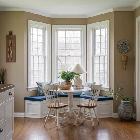 12  Bay Window Kitchen Nook Ideas That Will Steal Your Heart Kitchen Bay Window Table Ideas, Bay Window Round Table, Breakfast Area With Windows, Round Table In Bay Window, Bay Window Seat Dining Table, Table In Front Of Bay Window, Small Bay Window Breakfast Nook, Kitchen Nook Windows, Bay Kitchen Window Ideas