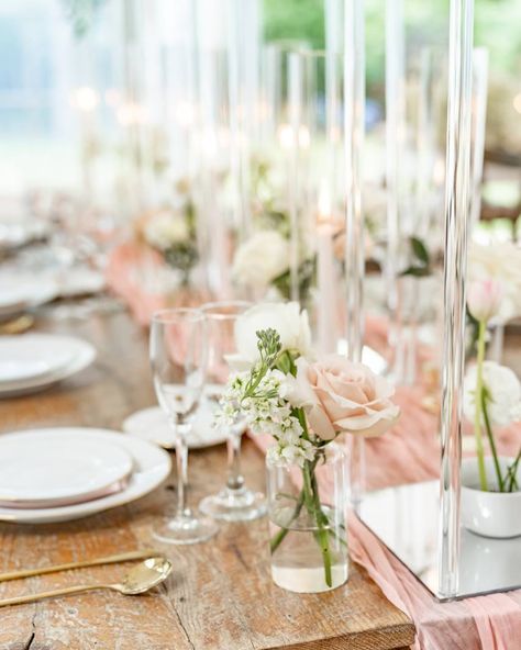 The perfect look for our newlyweds looking for a light and pastel wedding theme💗 This stunning photoshoot at @anthonywaynehouseweddings allowed us to join forced with many other vendors who all showed out and showed off! We enjoyed incorporating delicate details like fabric runners, ikebana centerpieces, candles and more into guest table decorations. We also wanted to add some grand elements to the decor, which turned into tall round centerpieces that held up the color scheme and vibe of th... Round Centerpieces, Stunning Photoshoot, Centerpieces Candles, Bridesmaids Gown, Pastel Wedding Theme, Event Hair, Sweetheart Table Wedding, Guest Table, Boutique Decor