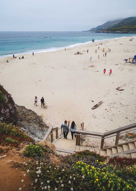 Two people walking down a wooden staircase to reach Garrapata State Beach. Two People Walking, Point Reyes Lighthouse, Big Sur Coastline, Wooden Staircase, Mcway Falls, Central Coast California, Adventurous Things To Do, Highway 1, People Walking